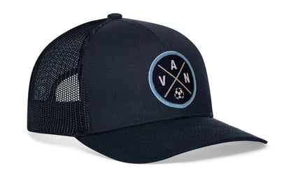 navy trucker hat viewed from the right side, showcasing a bold blue and white embroidered X patch prominently displayed on the front