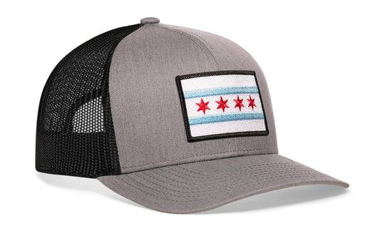 Gray-Black trucker hat viewed from the right side, showcasing a Chicago Flag Embroidered Rectangle Patch prominently displayed on the front