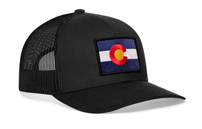 Black trucker hat viewed from the right side, showcasing a Colorado Flag Embroidered Rectangle Patch prominently displayed on the front