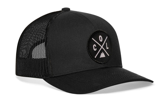 Black trucker hat viewed from the right side, showcasing a Colorado COL X Embroidered Circle Patch prominently displayed on the front