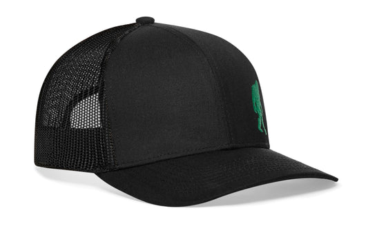 Black trucker hat viewed from the right side, showcasing a Green Bigfoot Black Sasquatch Flat Embroidery prominently displayed on the front