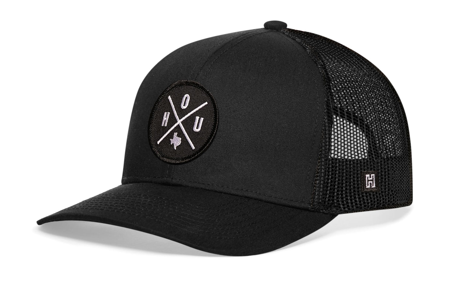 Houston Trucker Hat, black snapback showing Haka brandmark on left side mesh.
Rep Houston, TX.