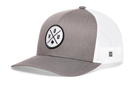 Houston Trucker Hat, gray-white snapback showing Haka brandmark on left side mesh.
Rep Houston, TX.
