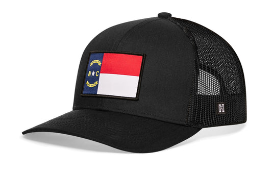 Haka North Carolina Flag Trucker Hat, Black snapback, fans of the Old North State. First in Flight