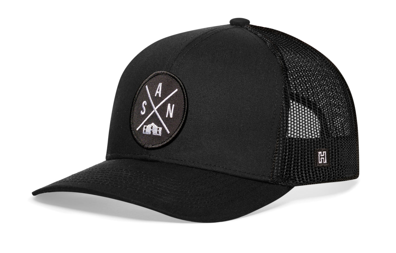 San Antonio Trucker Hat, black snapback showing Haka brandmark on left side mesh.
Rep San Antonio, TX.