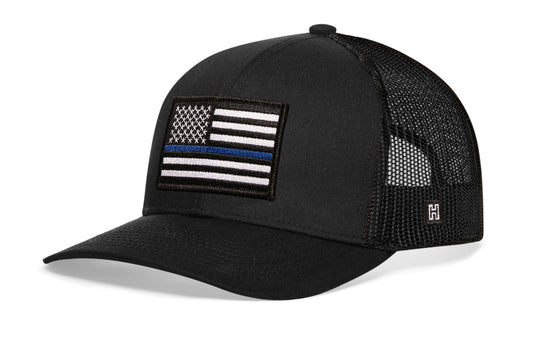 Thin Blue Line Trucker Hat, black snapback showing Haka brandmark on left side of cap.