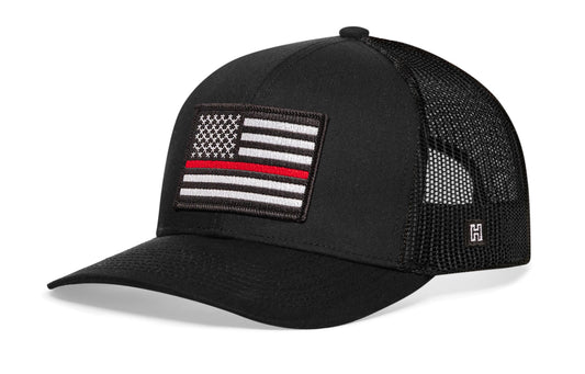 Thin Red Line Trucker Hat, black snapback showing Haka brandmark on left side of cap.